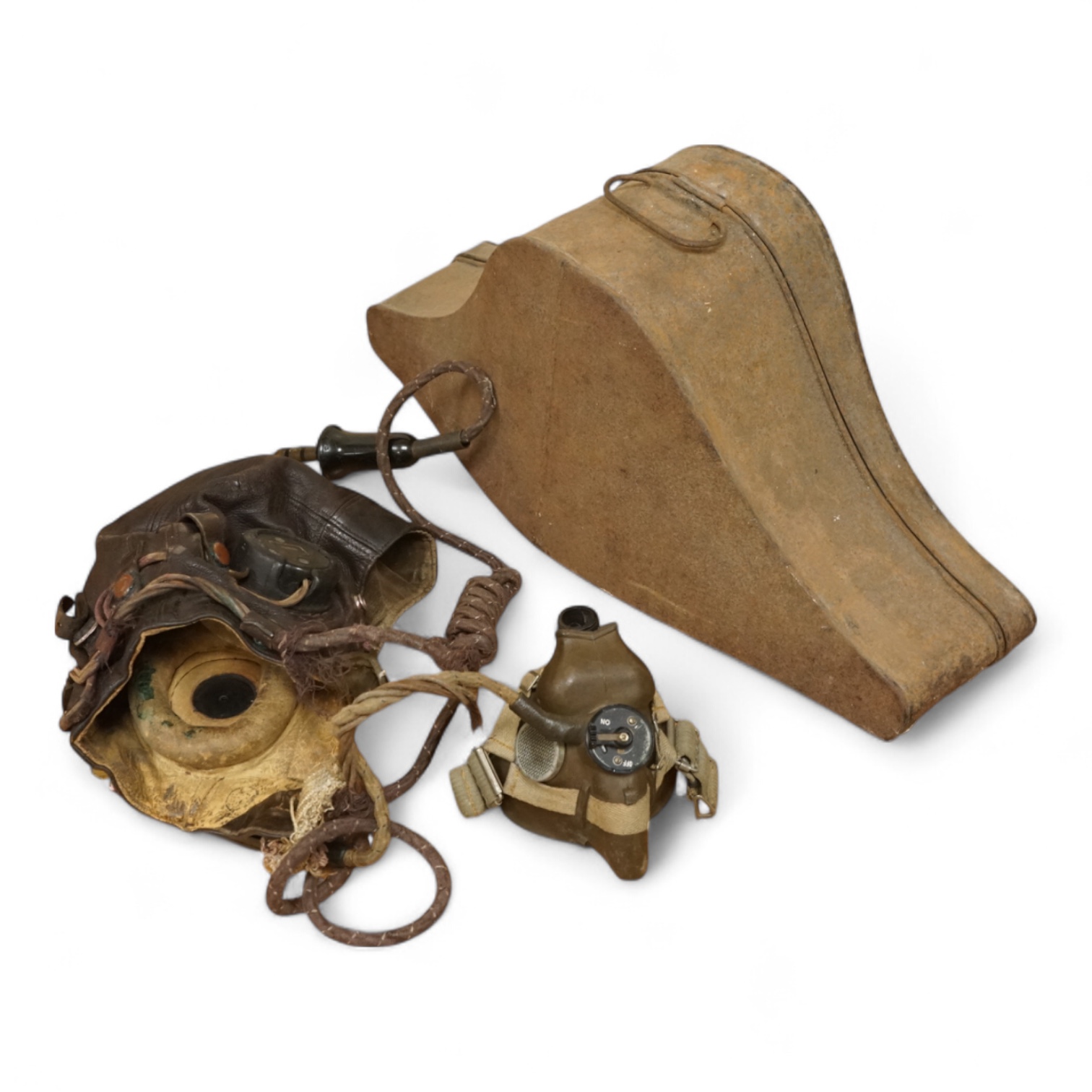 A WWII RAF Air Ministry aviator’s leather head-gear, with built-in padded headphones, oxygen mask with microphone and other electrics incorporated into it, marked with a crown and ‘AM 10A/13466’ to one earpiece, together